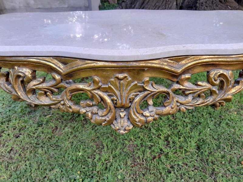 A French Style Ornately Carved Coffee Table with Marble Top