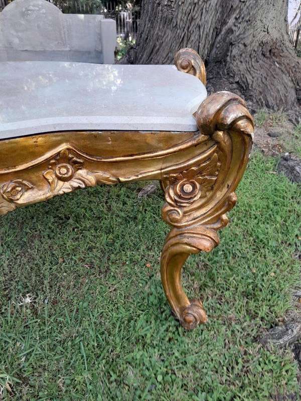 A French Style Ornately Carved Coffee Table with Marble Top