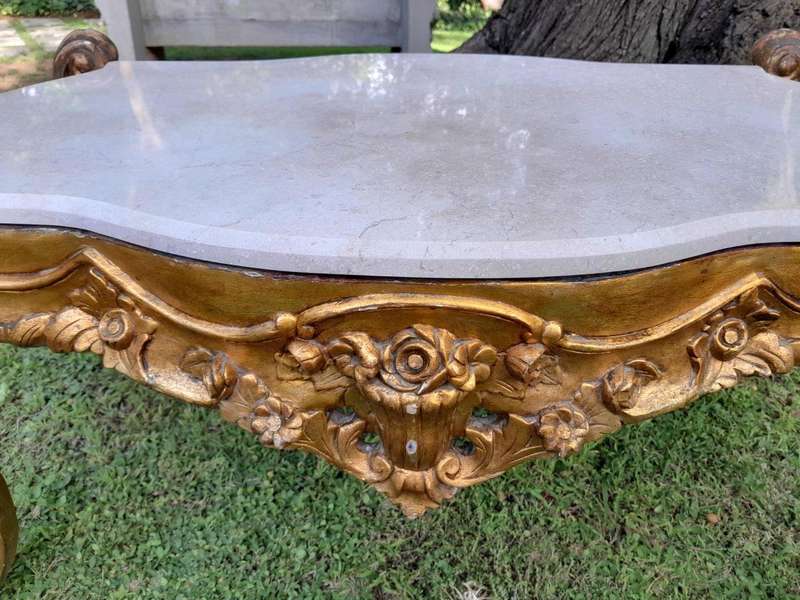 A French Style Ornately Carved Coffee Table with Marble Top