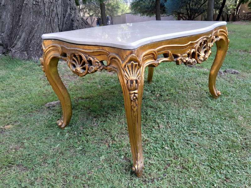 A French Style Ornately Carved Coffee Table with Marble Top