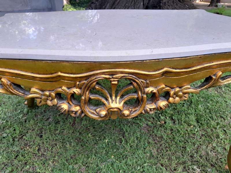 A French Style Ornately Carved Coffee Table with Marble Top