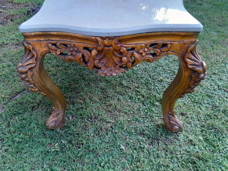 A French Style Ornately Carved Coffee Table with Marble Top
