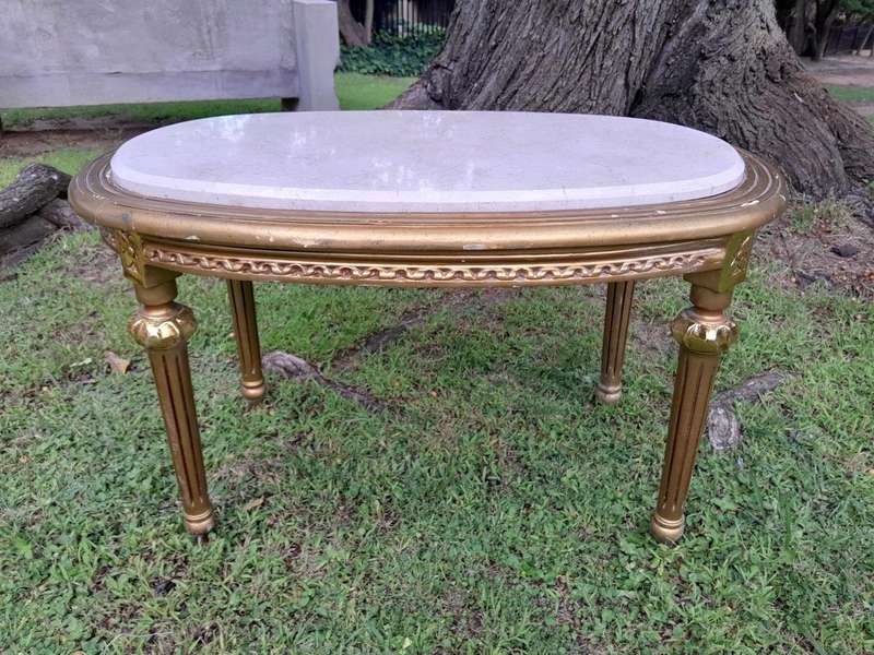 A French Style Ornately Carved Oval Coffee Table with Marble Top