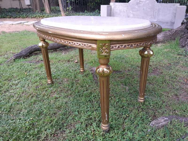 A French Style Ornately Carved Oval Coffee Table with Marble Top