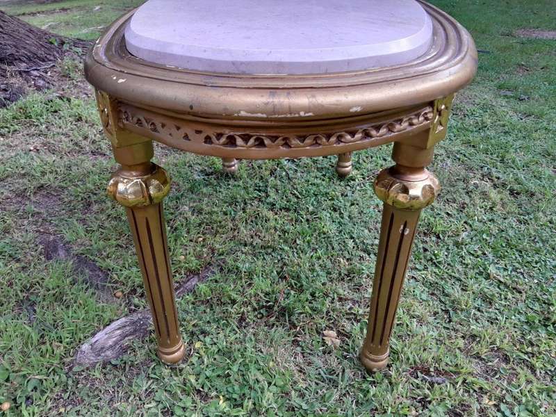 A French Style Ornately Carved Oval Coffee Table with Marble Top