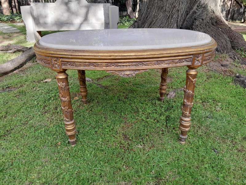 A French Style Ornately Carved Oval Coffee Table With Marble Top
