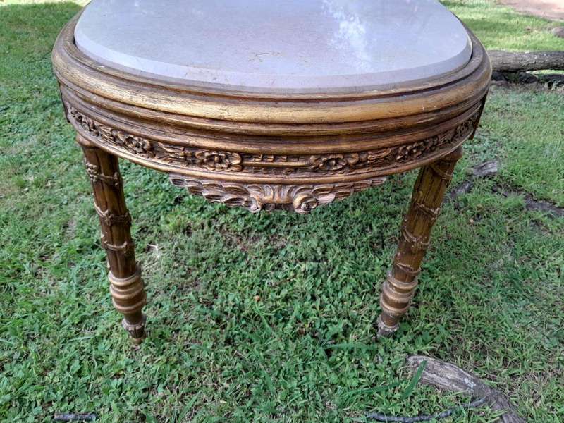 A French Style Ornately Carved Oval Coffee Table With Marble Top