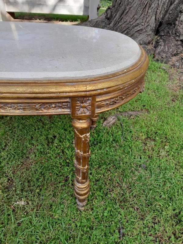 A French Style Ornately Carved Oval Coffee Table With Marble Top