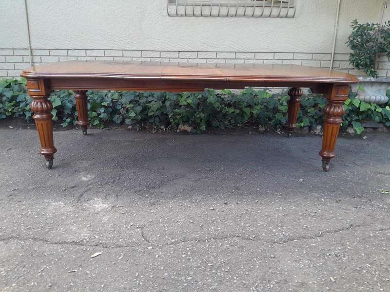 An Antique Victorian Mahogany Extension Dining Table With Original Porcelain Castors (Three Exten...