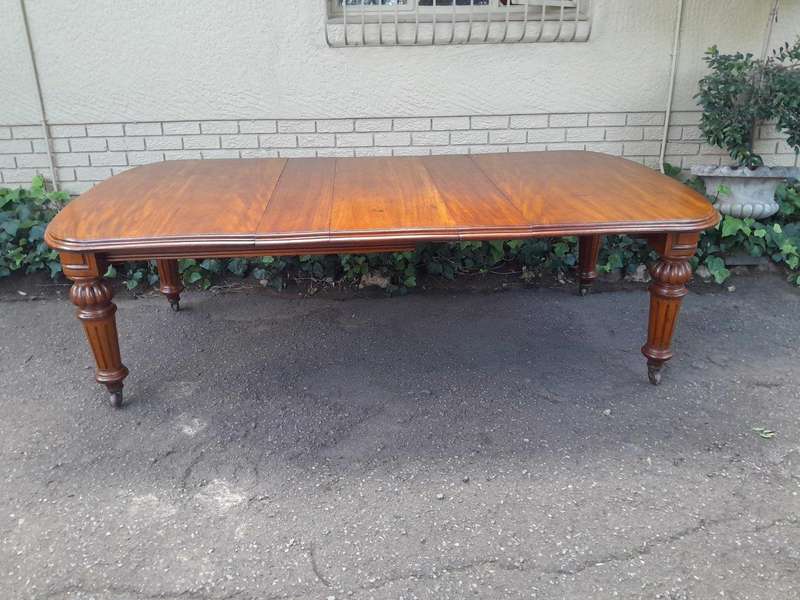 An Antique Victorian Mahogany Extension Dining Table With Original Porcelain Castors (Three Exten...