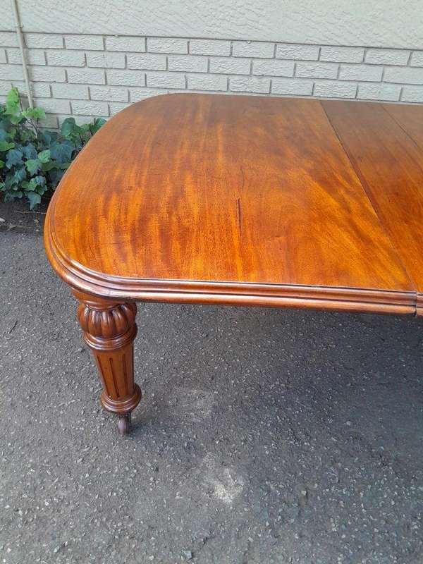 An Antique Victorian Mahogany Extension Dining Table With Original Porcelain Castors (Three Exten...