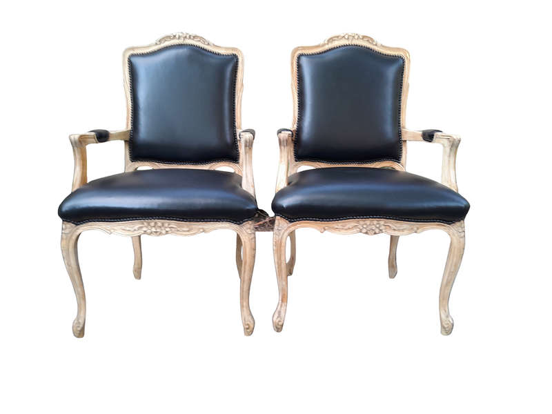 An Antique Pair of Carved Walnut Armchairs