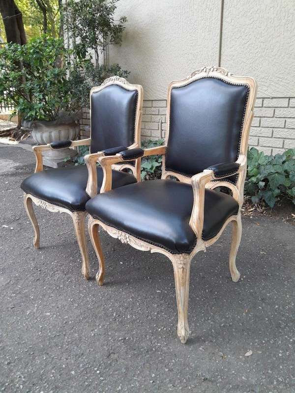 An Antique Pair of Carved Walnut Armchairs