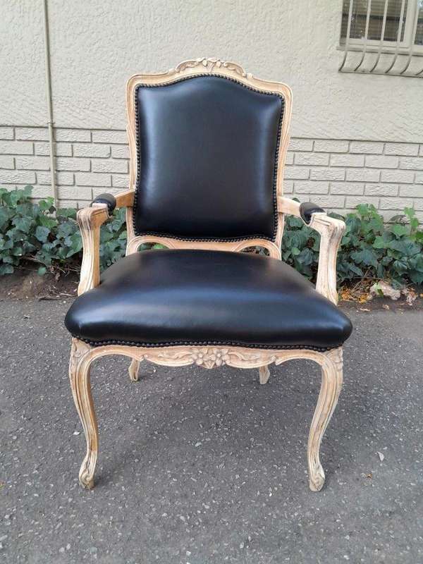 An Antique Pair of Carved Walnut Armchairs