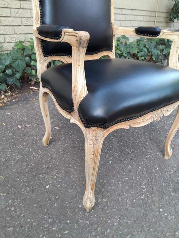 An Antique Pair of Carved Walnut Armchairs