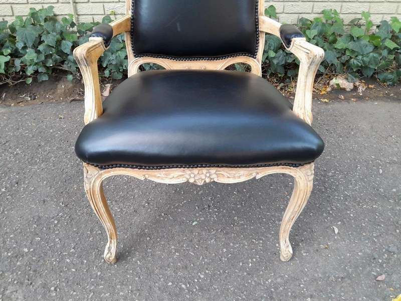 An Antique Pair of Carved Walnut Armchairs