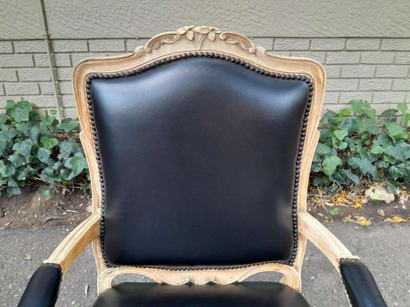 An Antique Pair of Carved Walnut Armchairs