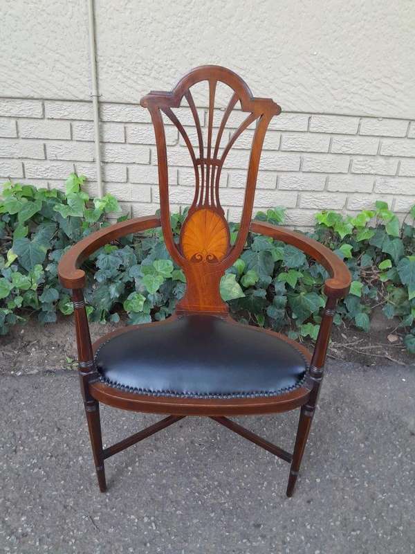 An Antique Inlaid Mahogany Arm-Chair