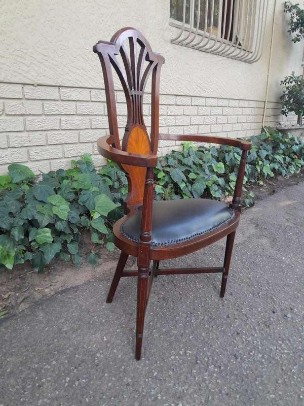 An Antique Inlaid Mahogany Arm-Chair