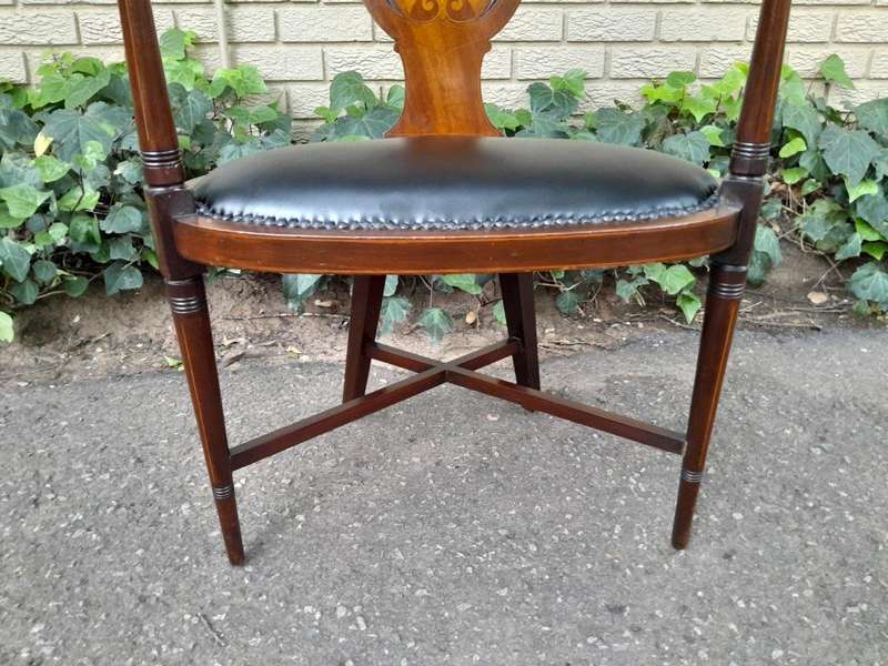 An Antique Inlaid Mahogany Arm-Chair