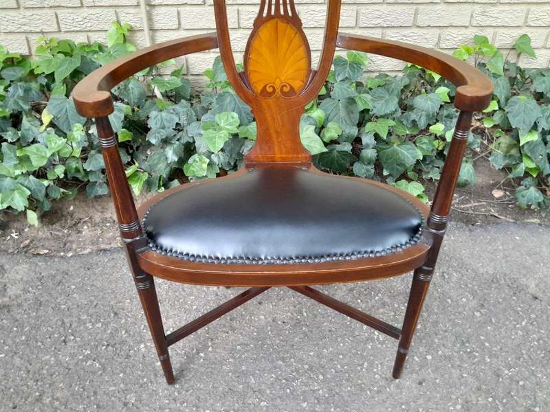 An Antique Inlaid Mahogany Arm-Chair