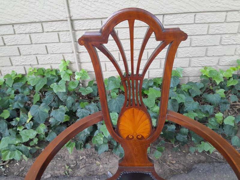 An Antique Inlaid Mahogany Arm-Chair