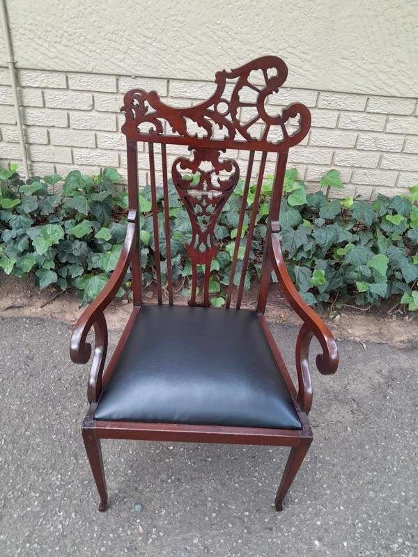 An Antique Edwardian Carved Mahogany Armchair