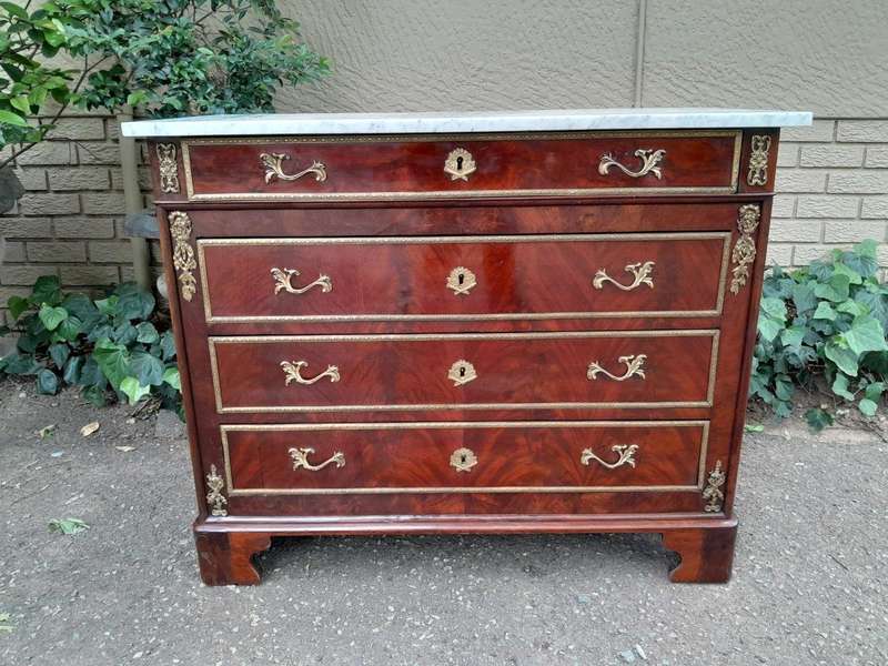 An Antique 19th Century French Louis Xvi Style Flame Mahogany Chest Of Drawer With Original Marbl...
