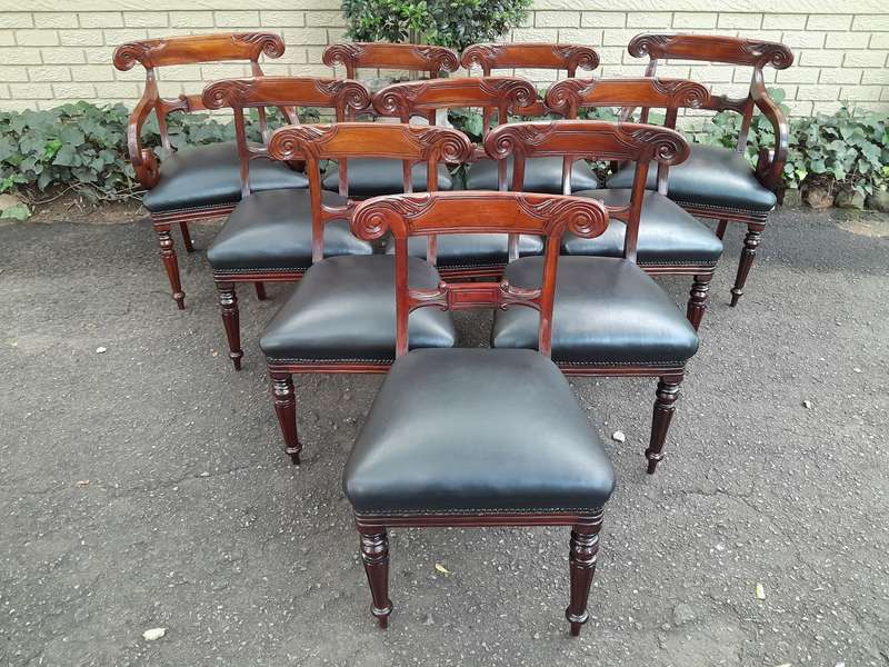 A 20th Century Set of Ten (10) William IV Style Mahogany Dining Chairs Consisting a Pair of Carve...