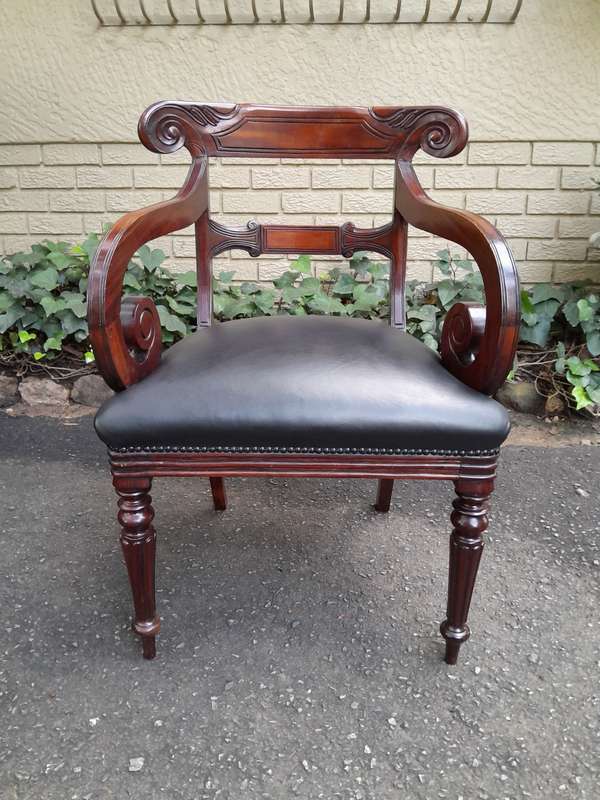 A 20th Century Set of Ten (10) William IV Style Mahogany Dining Chairs Consisting a Pair of Carve...