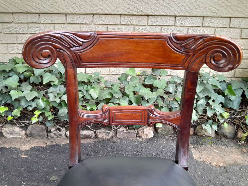 A 20th Century Set of Ten (10) William IV Style Mahogany Dining Chairs Consisting a Pair of Carve...