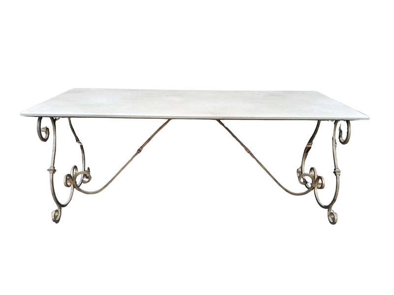 A  French Style Wrought Iron Console / Dining Table in an Antique Gold Finish with Cream Marble T...