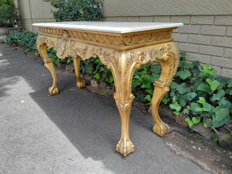 A 20th Century Gilded Console Table with Marble top