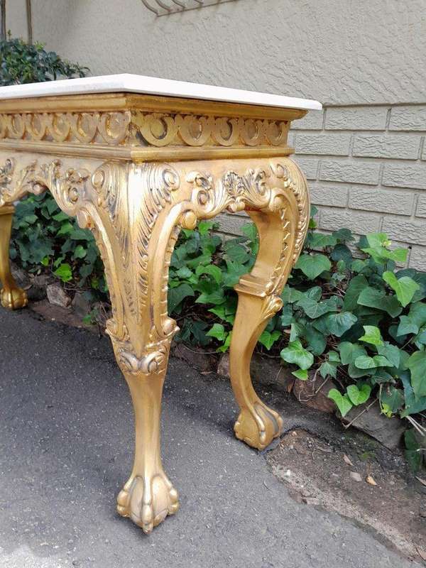 A 20th Century Gilded Console Table with Marble top