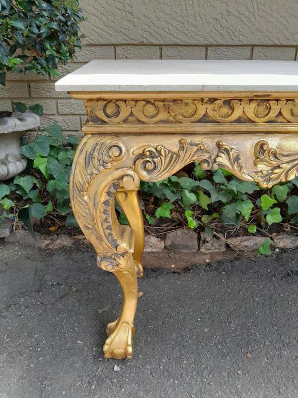 A 20th Century Gilded Console Table with Marble top