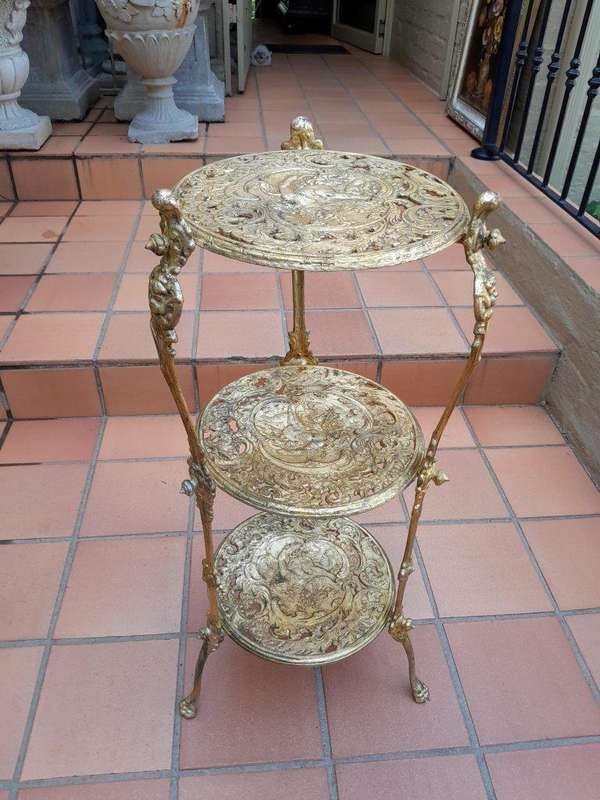 A Circa 1900s Cast Metal Display Stand