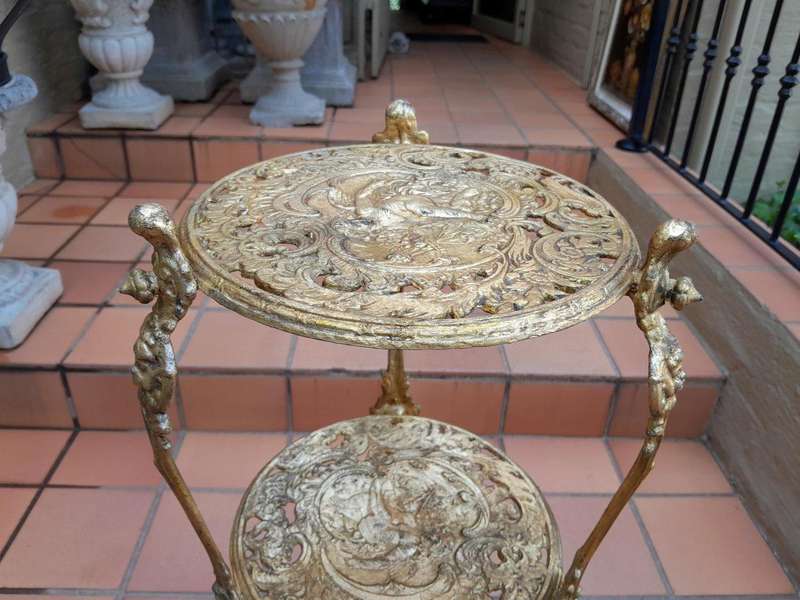 A Circa 1900s Cast Metal Display Stand