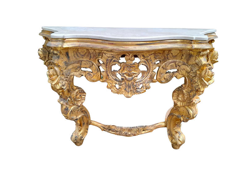 A 20th Century Heavily Carved and Hand Gilded with Gold Leaf Console Table with Cream Marble Top