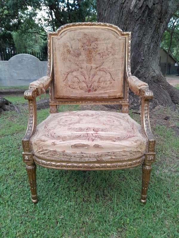 A 20th Century French Pair of Gilded Armchairs