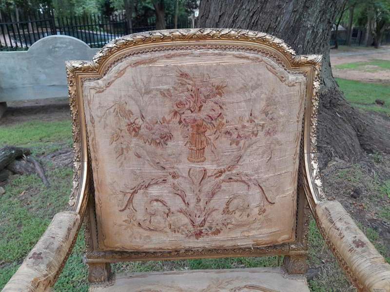 A 20th Century French Pair of Gilded Armchairs