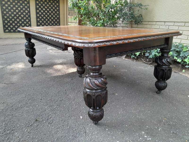 A Massive Antique 19th Century English Heavily Carved Extending Table With Crank Handle