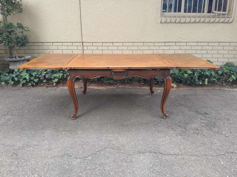 A 20th Century French  Carved Oak Extension Dining Table / Entrance Table / Table  with Two Leaves
