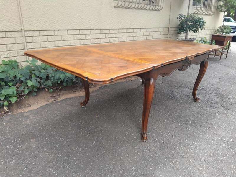 A 20th Century French  Carved Oak Extension Dining Table / Entrance Table / Table  with Two Leaves