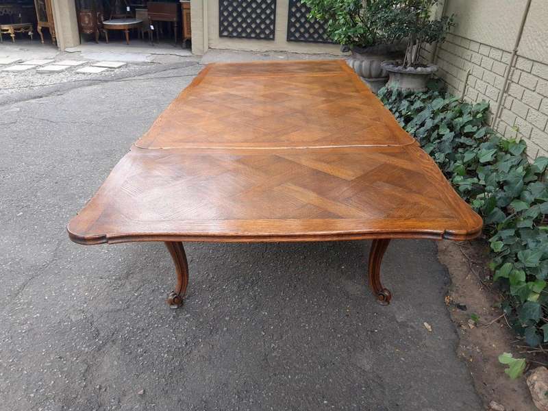 A 20th Century French  Carved Oak Extension Dining Table / Entrance Table / Table  with Two Leaves