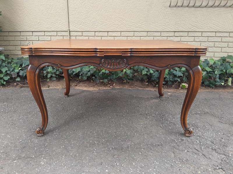 A 20th Century French  Carved Oak Extension Dining Table / Entrance Table / Table  with Two Leaves