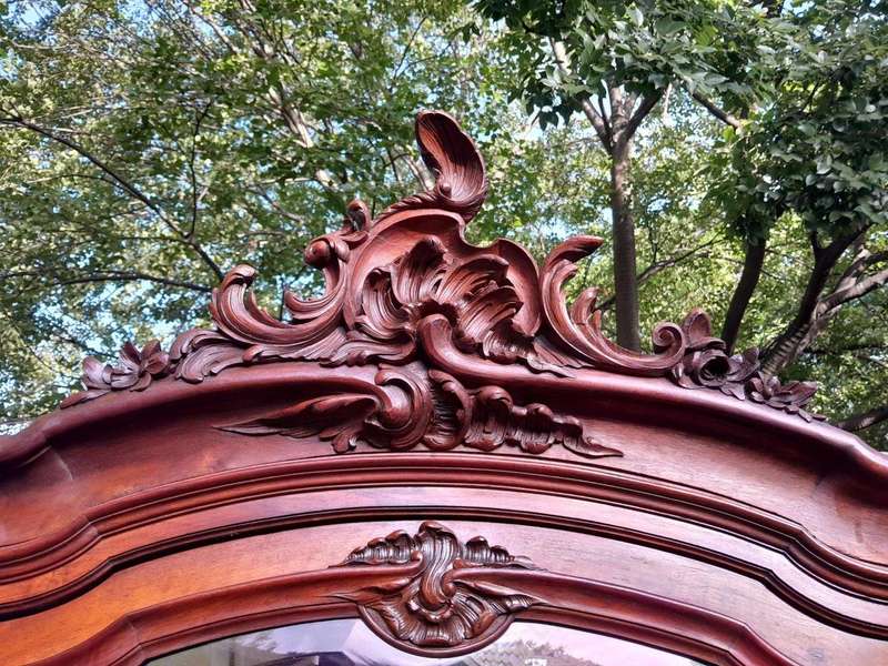 A 20TH Century Circa 1900s French Carved Mahogany Armoire with Bevelled Mirror and Five Shelves