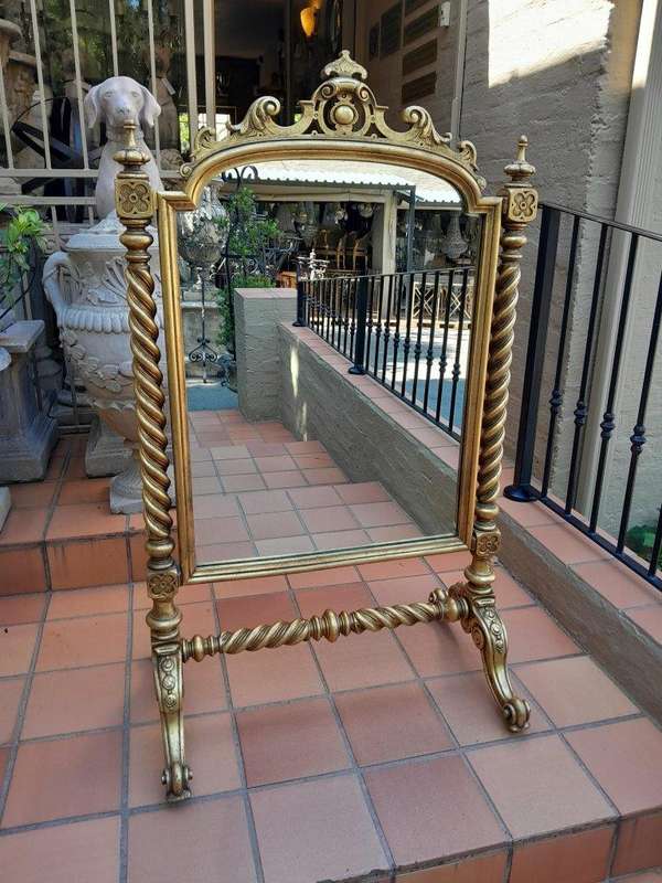 A 20th Century Giltwood Floor Cheval Mirror on Castors