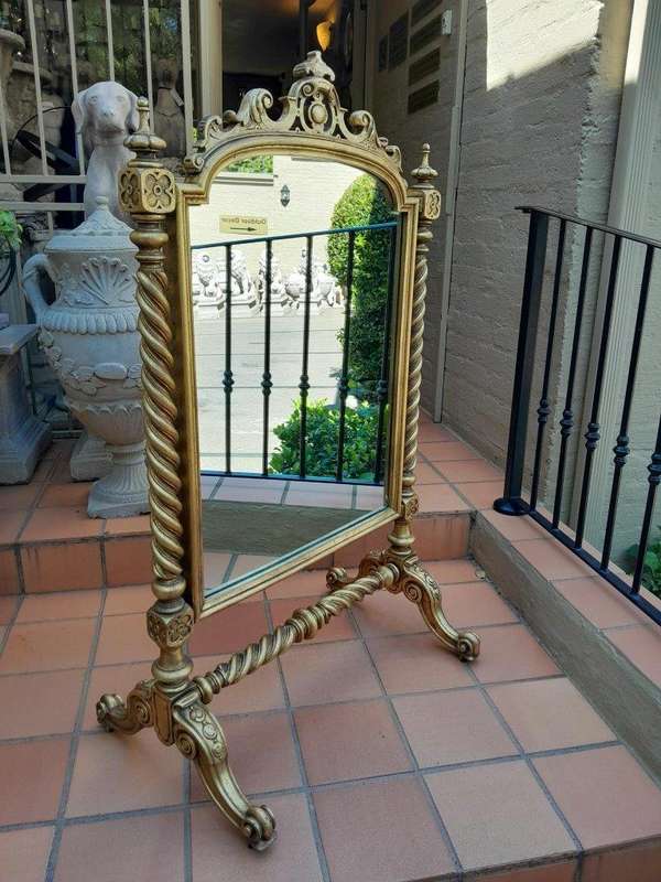 A 20th Century Giltwood Floor Cheval Mirror on Castors