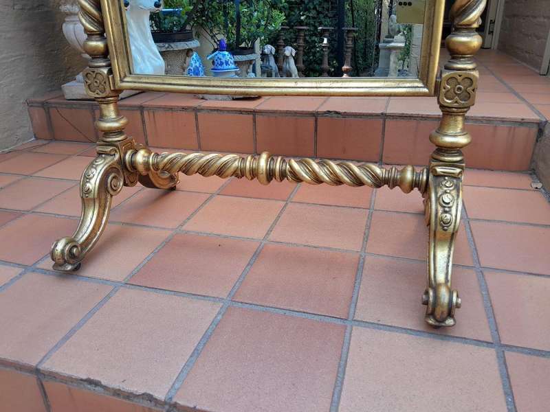 A 20th Century Giltwood Floor Cheval Mirror on Castors