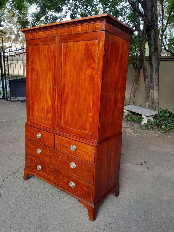 An Antique Circa Victorian Circa 1890s Mahogany Linen Press with Brass Handles  Five Shelves a...